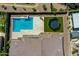 Backyard pool with a trampoline, and patio area, perfect for outdoor entertaining in the sun at 9253 W Sands Dr, Peoria, AZ 85383