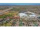 Aerial view captures the proximity of residential area to high school, tennis courts, and baseball field at 9253 W Sands Dr, Peoria, AZ 85383
