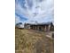 Wide angle view of backyard includes a covered patio and plenty of space at 9601 N 35Th Dr, Phoenix, AZ 85051