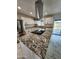 Bright kitchen featuring granite countertops, new appliances, and tile flooring at 9601 N 35Th Dr, Phoenix, AZ 85051