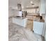 Bright kitchen featuring granite countertops, new appliances, and tile flooring at 9601 N 35Th Dr, Phoenix, AZ 85051