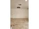 Bright living room featuring stunning, marble-like tile flooring throughout at 9601 N 35Th Dr, Phoenix, AZ 85051