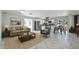 Inviting living room with modern decor open to a bright kitchen with stainless appliances at 9601 N 35Th Dr, Phoenix, AZ 85051