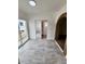 Bright living space with slider door, unique archway, and mirrored closet doors at 9601 N 35Th Dr, Phoenix, AZ 85051