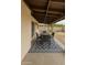 Outdoor patio features a dining table with seating and decorative patterned rug at 9601 N 35Th Dr, Phoenix, AZ 85051