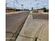Quiet residential street featuring well-maintained homes and lush landscaping at 9601 N 35Th Dr, Phoenix, AZ 85051