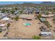 Aerial view of desert property highlighting the spacious lot, home, pool, and neighborhood at 9713 E El Paso St, Mesa, AZ 85207