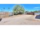 Large desert backyard with fenced perimeter and plenty of room for desert toys at 9713 E El Paso St, Mesa, AZ 85207