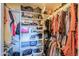 Spacious walk-in closet with ample shelving and hanging storage, perfect for organizing clothes and accessories at 9713 E El Paso St, Mesa, AZ 85207