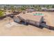 Charming single-Gathering home featuring a pool, spacious driveway with basketball hoop, and well-maintained landscaping at 9713 E El Paso St, Mesa, AZ 85207