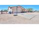 Single Gathering desert home with two car garage and large basketball court at 9713 E El Paso St, Mesa, AZ 85207