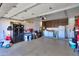 Large garage with ample storage, shelving, and parking space at 9713 E El Paso St, Mesa, AZ 85207