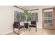 Cozy breakfast nook with comfortable seating, bright windows, and a charming view of the outdoors at 9809 W Behrend Dr, Peoria, AZ 85382