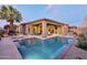 Inviting backyard oasis with a sparkling pool, patio, and comfortable lounge furniture at 9847 E Preserve Way, Scottsdale, AZ 85262