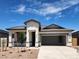 Charming single story home with desert landscaping, neutral paint, and a two car garage at 10524 W Bloch Rd, Tolleson, AZ 85353