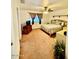 Relaxing bedroom with carpet flooring, a ceiling fan, and neutral decor at 10705 W Montecito Ave, Phoenix, AZ 85037