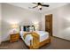Comfortable bedroom with neutral tones, soft lighting, and a cozy bed at 11717 E Estrella Ave, Scottsdale, AZ 85259