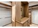 Well-organized walk-in closet with custom shelving and ample storage space at 11717 E Estrella Ave, Scottsdale, AZ 85259