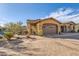 Charming single-Gathering home features a two-car garage, terra cotta roof, and desert landscaping at 17874 N 93Rd Way, Scottsdale, AZ 85255