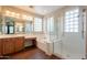 Elegant bathroom featuring a soaking tub, separate shower, and dual vanities at 18283 N 93Rd St, Scottsdale, AZ 85255