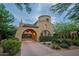 Beautiful Mediterranean home featuring an attached garage, desert landscaping, and distinctive architecture at 18283 N 93Rd St, Scottsdale, AZ 85255