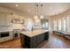 Spacious kitchen with a large island, modern appliances, and ample cabinet space at 18283 N 93Rd St, Scottsdale, AZ 85255