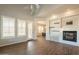 Spacious living room features a fireplace and views to the yard at 18283 N 93Rd St, Scottsdale, AZ 85255