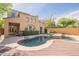 Beautiful private pool surrounded by a wood deck and lush landscaping, ideal for outdoor relaxation and enjoyment at 18283 N 93Rd St, Scottsdale, AZ 85255