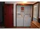Spacious laundry room with washer, dryer, and adjacent pantry area at 201 S Greenfield Rd # 331, Mesa, AZ 85206