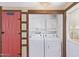 Laundry room with full-size washer and dryer units and access to pantry at 201 S Greenfield Rd # 331, Mesa, AZ 85206