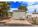 Backyard shed with concrete patio and easy access to property for storage at 201 S Greenfield Rd # 331, Mesa, AZ 85206