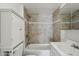 Cozy bathroom showcases tiled shower-tub and vanity for comfort at 2118 E Oak St, Phoenix, AZ 85006