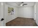 This is a cozy bedroom that features carpet and ceiling fan at 2118 E Oak St, Phoenix, AZ 85006