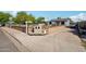 Charming single-story home featuring a well-maintained front yard and a 'Guest House' sign at 2118 E Oak St, Phoenix, AZ 85006