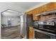 Cozy kitchen features stainless steel appliances, granite countertops, and tile backsplash at 2118 E Oak St, Phoenix, AZ 85006