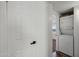This laundry room features white stackable washer and dryer for convenience at 2118 E Oak St, Phoenix, AZ 85006
