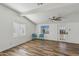 Bright living room features ample natural light, new flooring, ceiling fan and two accent chairs for a modern style at 2118 E Oak St, Phoenix, AZ 85006