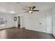 Spacious living room features new flooring, neutral walls, contemporary ceiling fan, and easy access to backyard at 2118 E Oak St, Phoenix, AZ 85006
