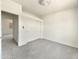 Carpeted bedroom with closet and doorways at 2300 E Magma Rd # 74, San Tan Valley, AZ 85143
