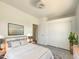 Bright bedroom with neutral walls, ceiling fan, closet and a plush bed at 2300 E Magma Rd # 74, San Tan Valley, AZ 85143