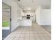 Bright kitchen with white cabinets, stainless steel appliances, and adjacent dining area at 2300 E Magma Rd # 74, San Tan Valley, AZ 85143