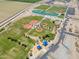 Aerial view of park featuring baseball fields, lake and a recreation area at 23693 W Grove St, Buckeye, AZ 85326