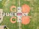 Aerial view of community baseball fields, well maintained and ready for a game at 23693 W Grove St, Buckeye, AZ 85326