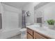 The bathroom is well lit with a shower and modern sink at 23693 W Grove St, Buckeye, AZ 85326