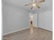Empty bedroom featuring a ceiling fan, baseboard and closet at 23693 W Grove St, Buckeye, AZ 85326