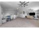 Expansive bonus room offers seating, a workspace, and entertainment area at 23693 W Grove St, Buckeye, AZ 85326