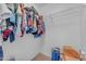 This walk-in closet with hanging clothes rack has room for storage and organization at 23693 W Grove St, Buckeye, AZ 85326