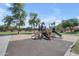 Playground with a slide, climbing area, and ample space for fun activities at 23693 W Grove St, Buckeye, AZ 85326
