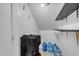 The storage room is well lit with a storage rack at 23693 W Grove St, Buckeye, AZ 85326