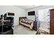 A comfortable bedroom offers a cozy bed, a work desk, and plenty of space to relax at 23862 W Chambers St, Buckeye, AZ 85326